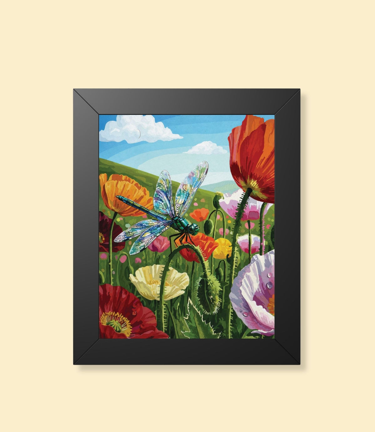 Dragonfly meadow framed poster with black frame on a cream background