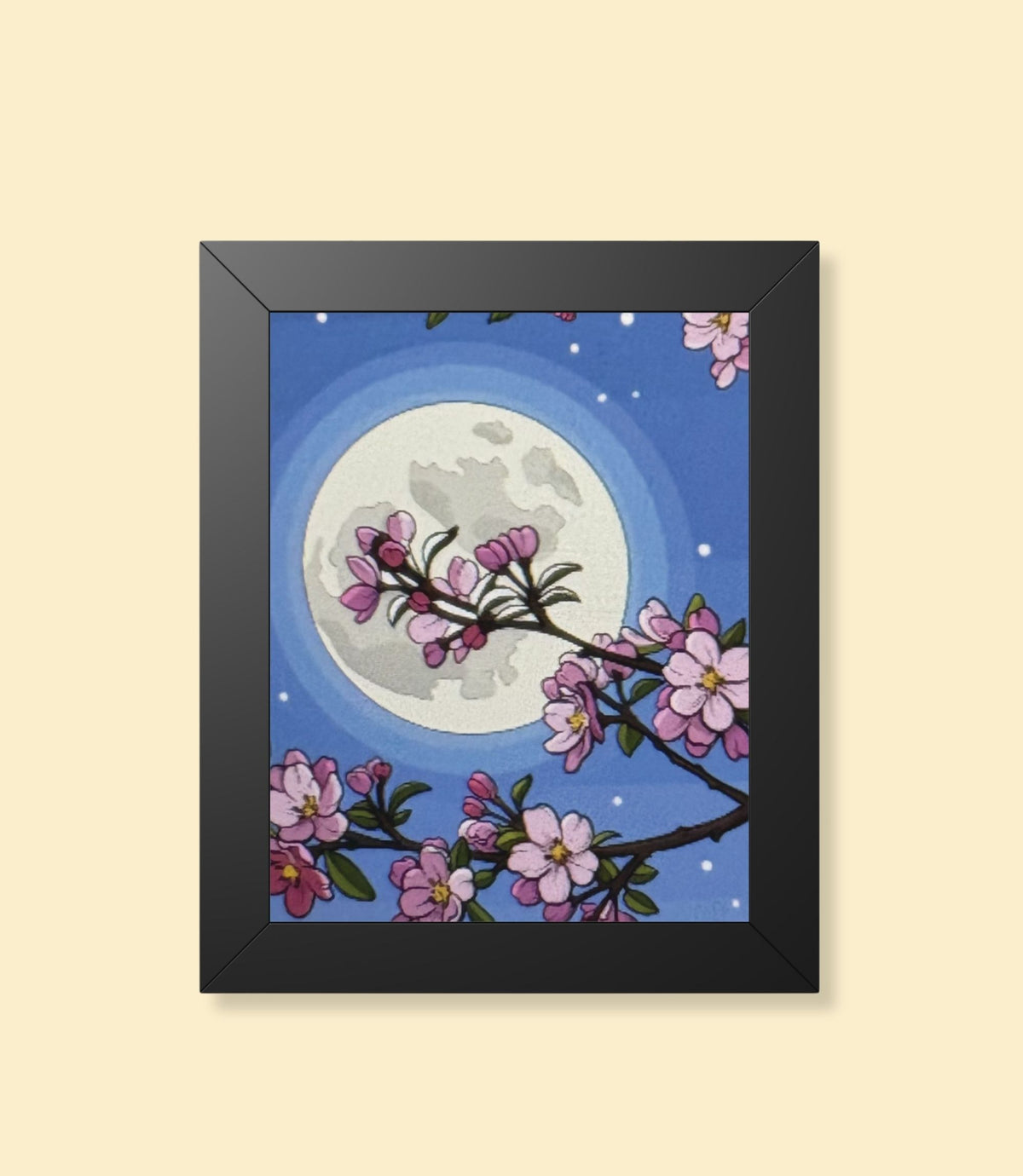 Cherry blossom moon framed poster with black frame on a cream background