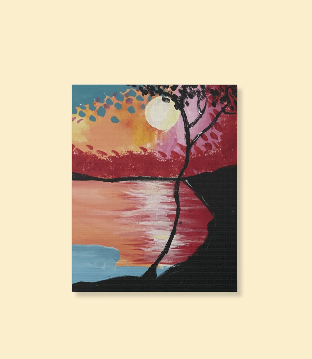 Sunset lake and silhouetted tree canvas wall art on a cream background
