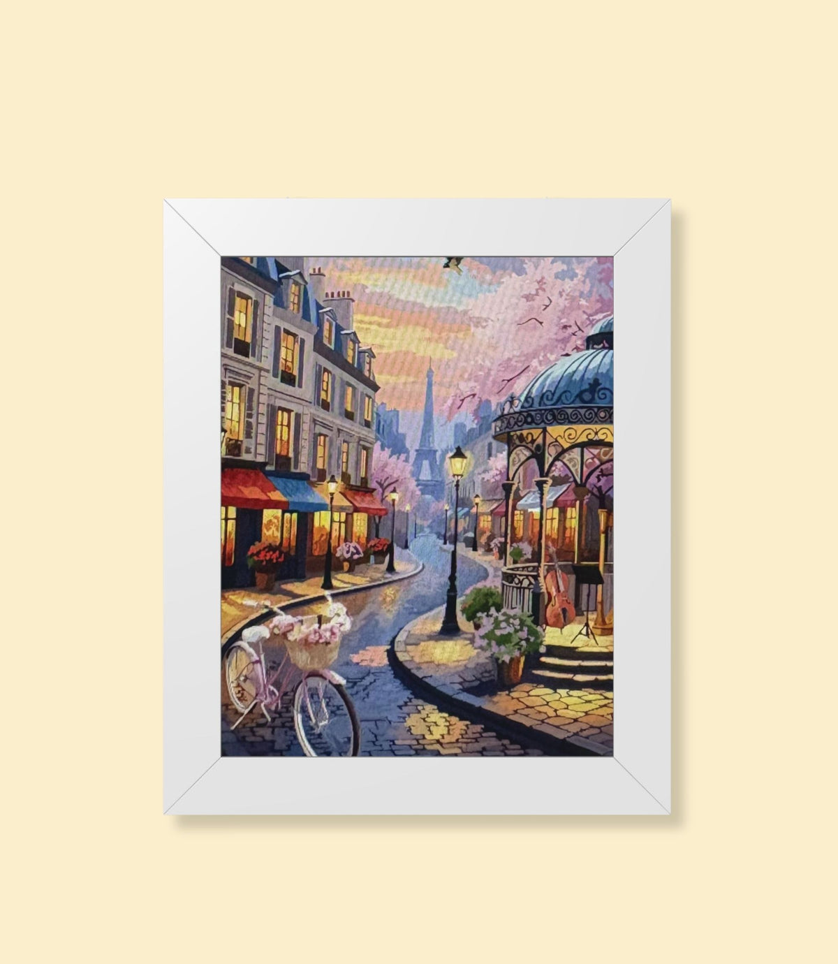 Paris street café framed poster with white frame on a cream background