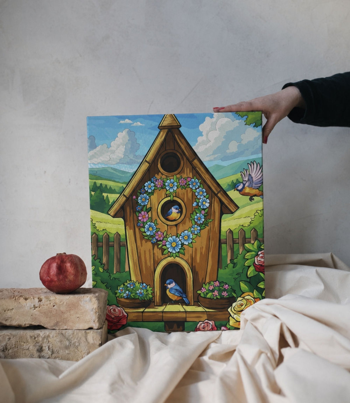 Person holding whimsical floral birdhouse stretched canvas wall art