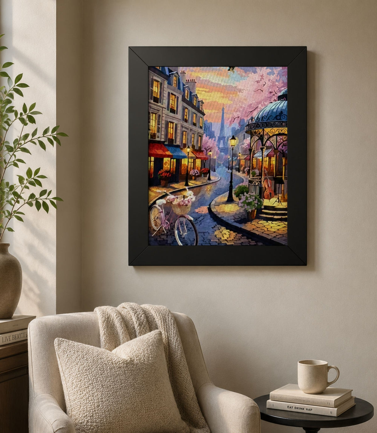 Black-framed Paris street café poster displayed in a modern interior