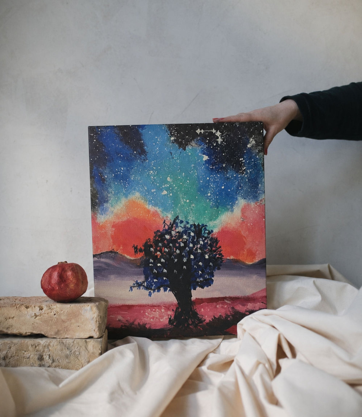 Person holding galaxy tree stretched canvas wall art
