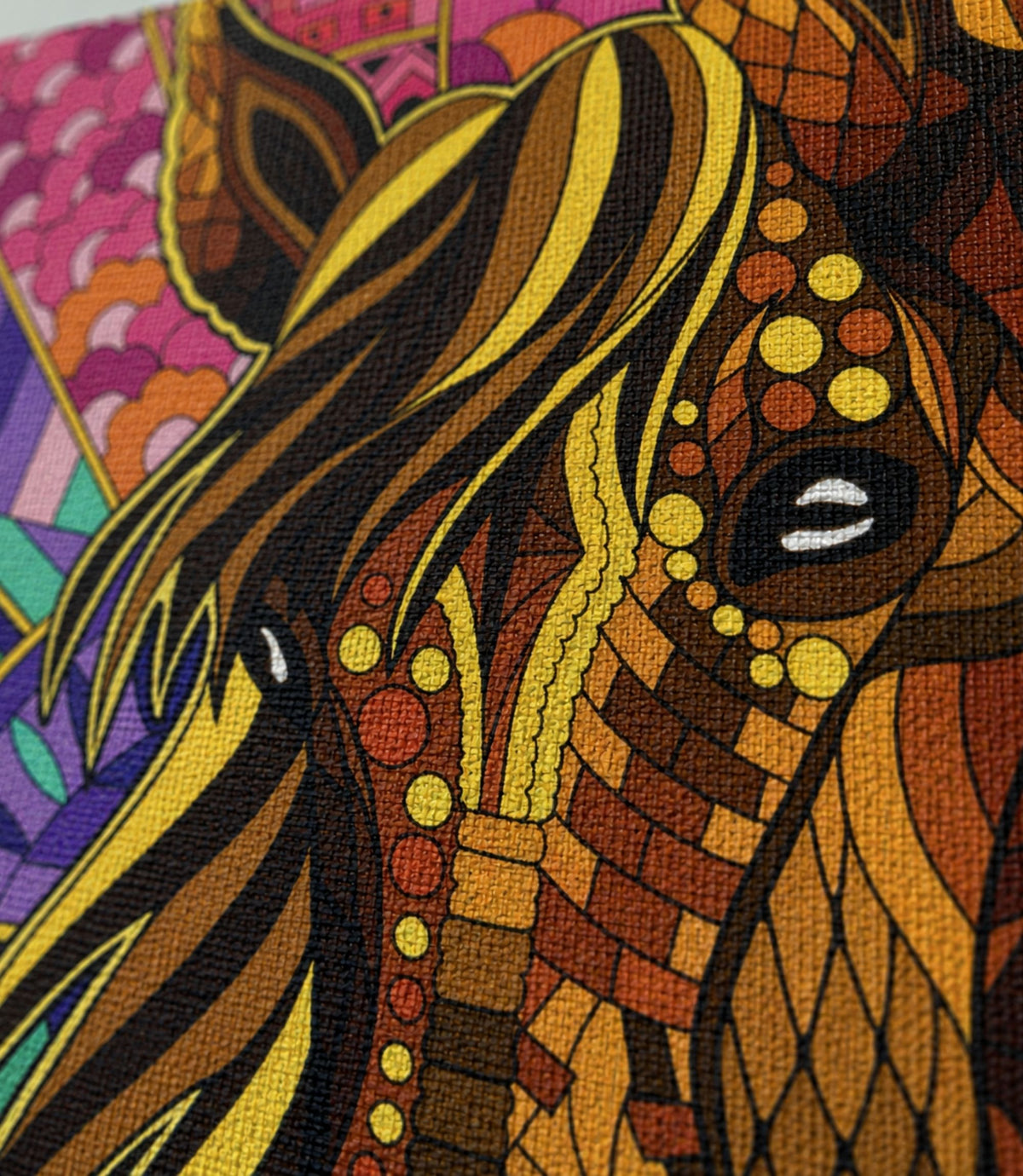 Close-up of colourful mosaic horse artwork and matte canvas texture