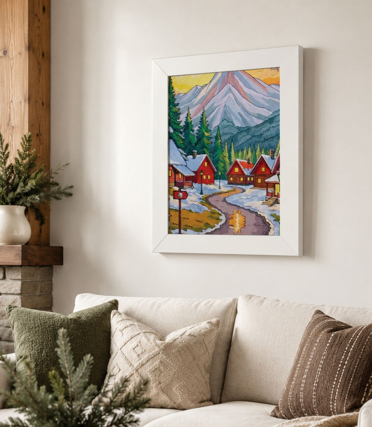 White-framed winter mountain village poster displayed in a modern interior