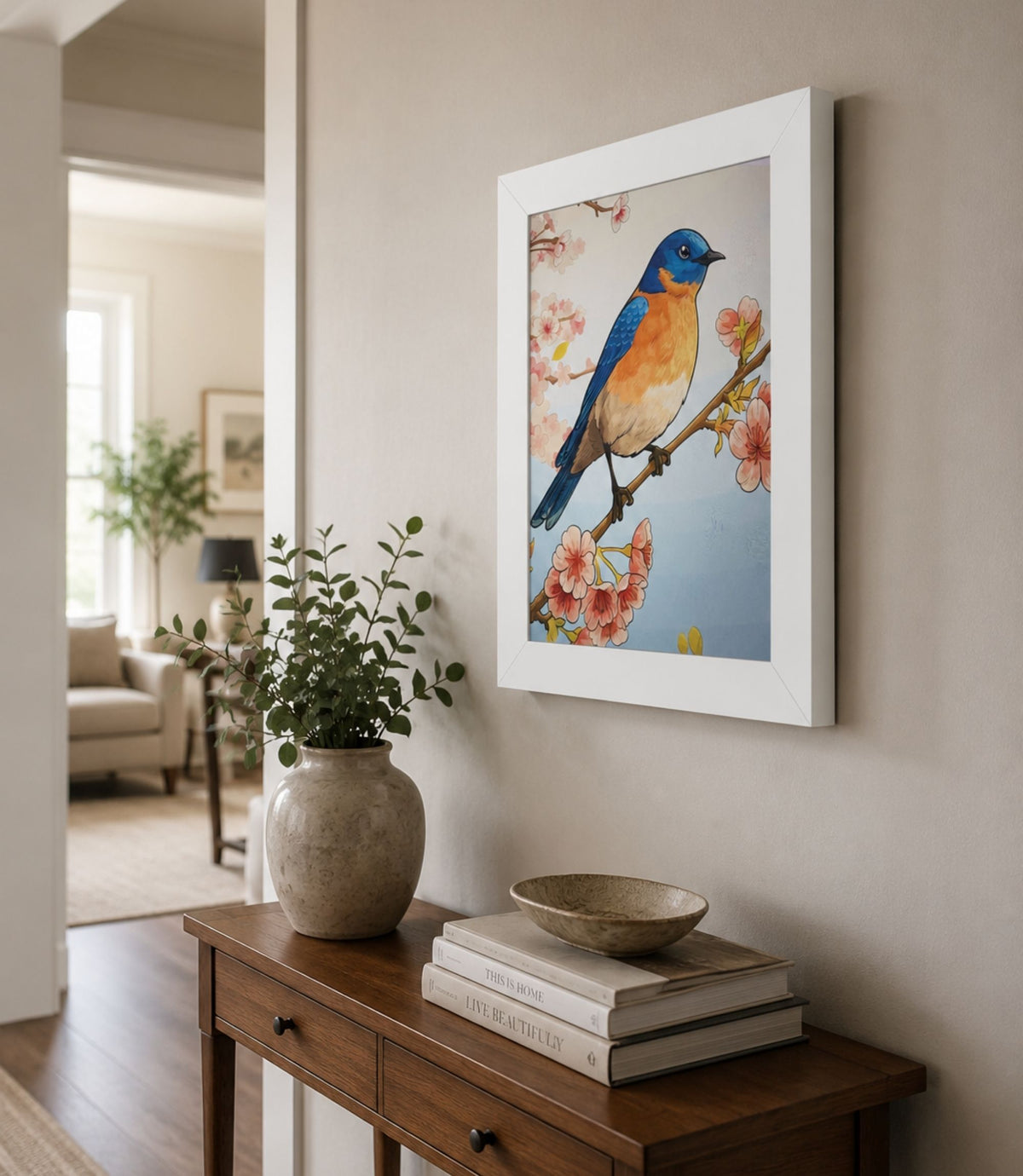 White-framed bluebird and cherry blossoms poster displayed in a modern interior