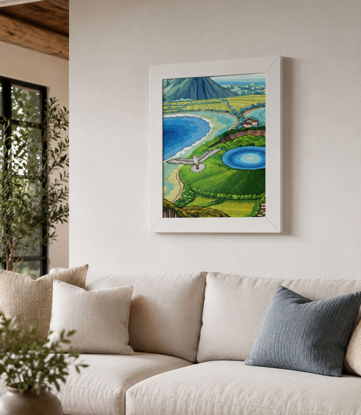 White-framed volcanic coast and seagull poster displayed in a modern interior