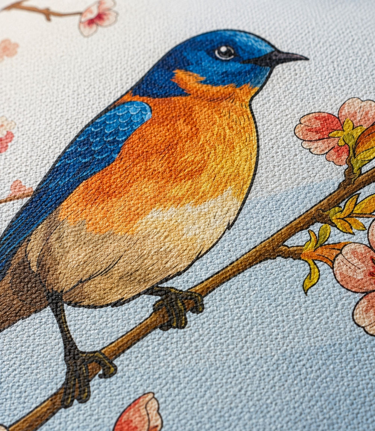 Close-up of bluebird and cherry blossoms artwork and matte canvas texture