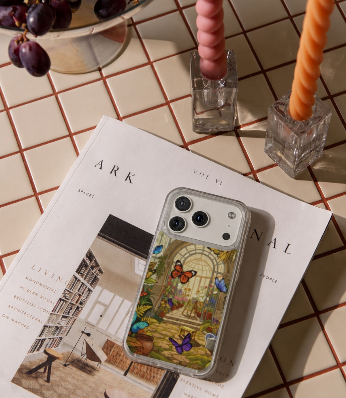 Butterfly conservatory clear phone case styled in an everyday lifestyle scene