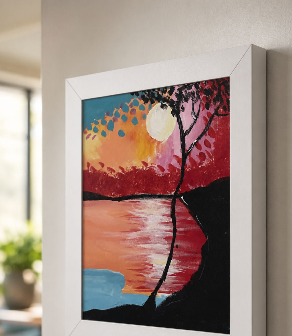 Close-up side view of black-framed sunset lake and silhouetted tree art print