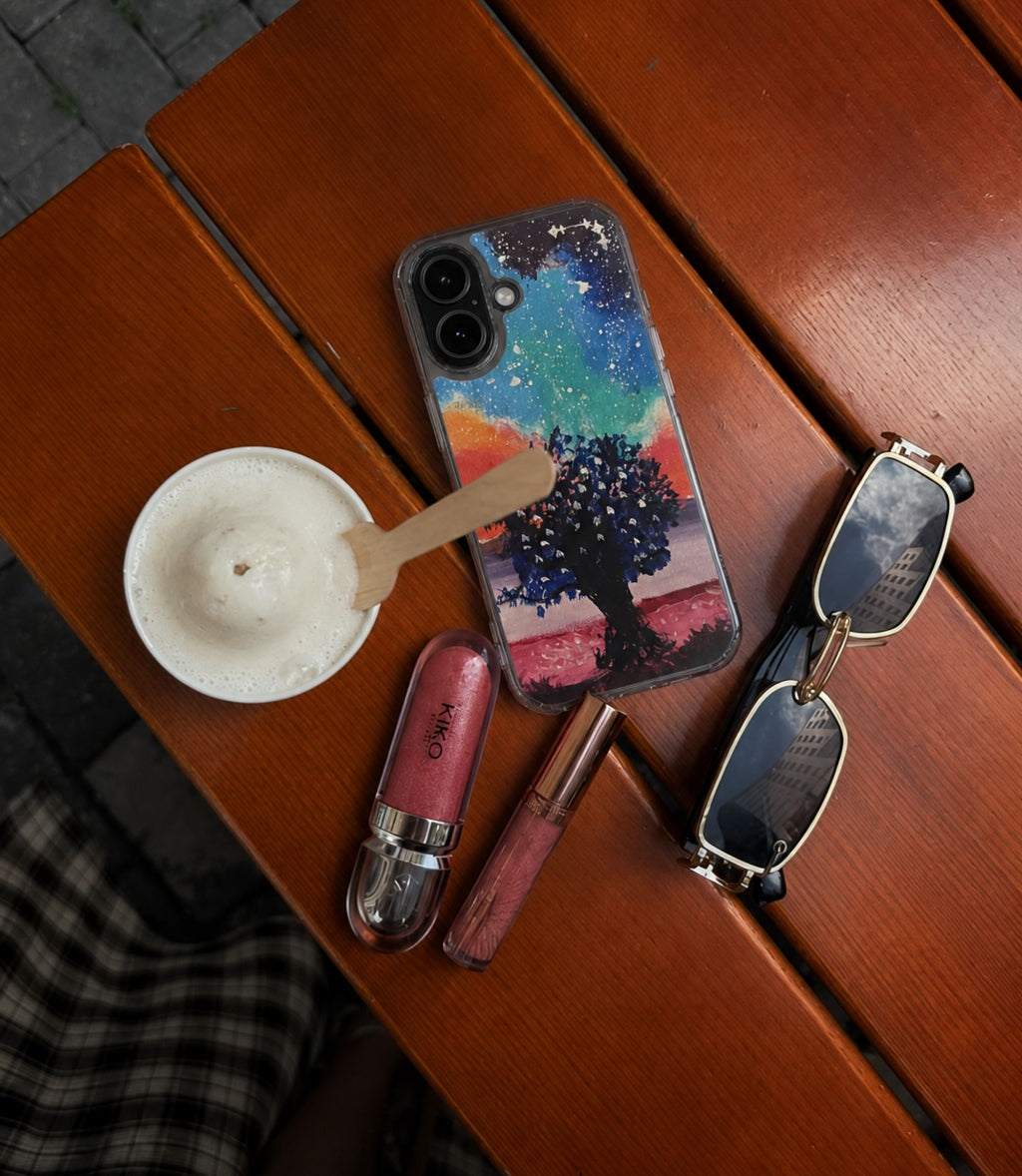 Galaxy tree clear phone case styled in an everyday lifestyle scene