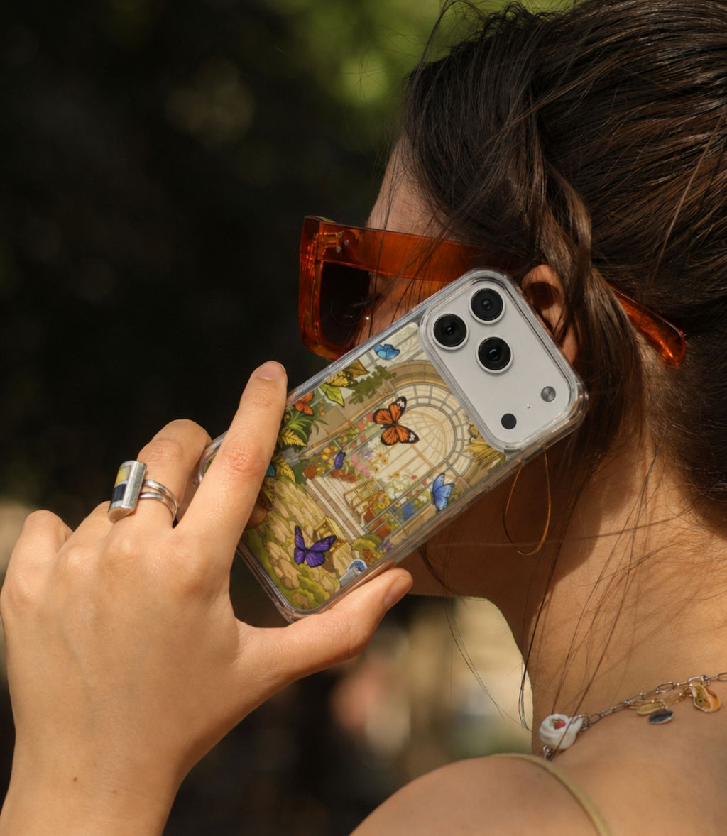 Person holding butterfly conservatory clear magnetic phone case