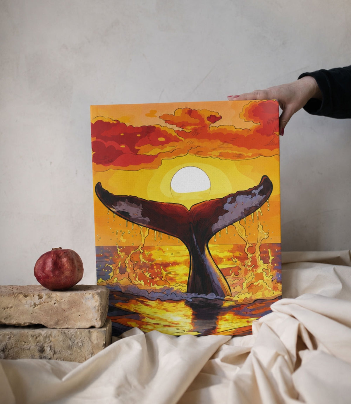 Person holding whale tail at sunset stretched canvas wall art