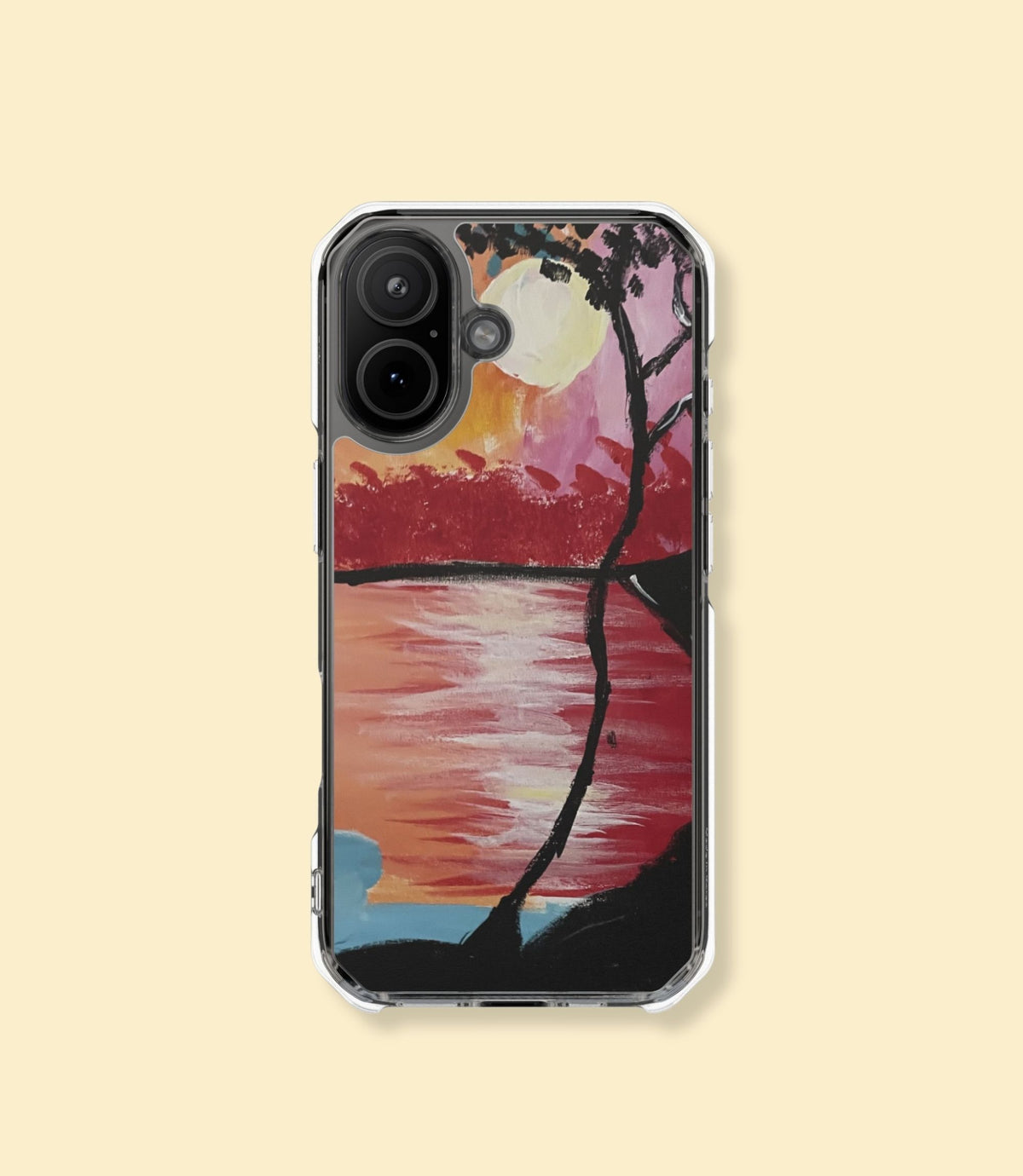 Sunset lake and silhouetted tree clear magnetic phone case for iPhone 17 on a cream background